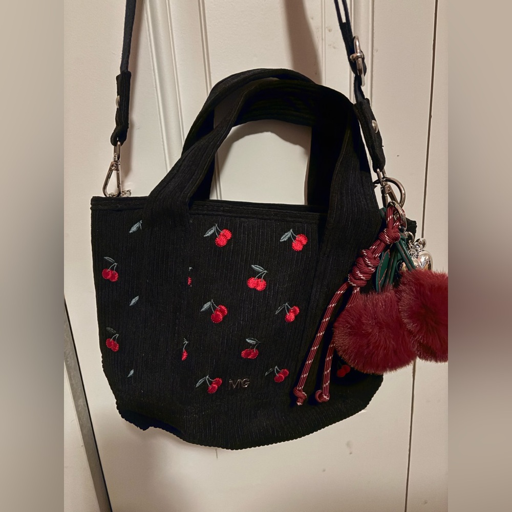 Madden Girl Cherry-Embroidered Black Tote Bag with Pom Charm